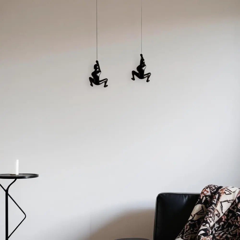 Set of Two Black Resin Climbing Man Hanging Dimensional Sculpture HomeRoots