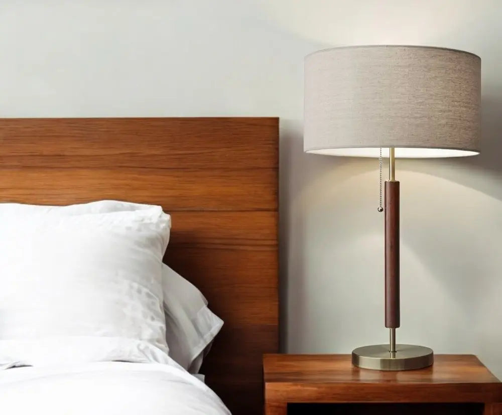 26" Antiqued Brass Solid Wood Table Lamp With Beige Drum Shade HomeRoots