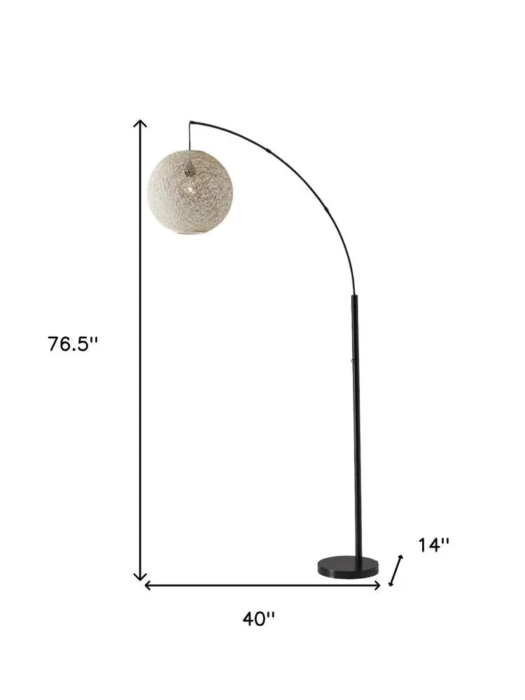 77" Antiqued Bronze Arched Floor Lamp With Groovy Beige Abstract Wicker Globe Shade HomeRoots