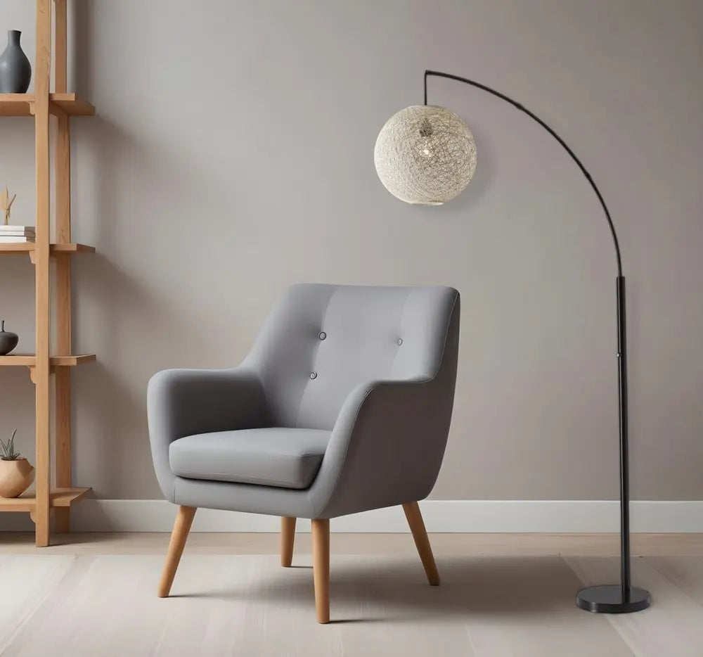 77" Antiqued Bronze Arched Floor Lamp With Groovy Beige Abstract Wicker Globe Shade HomeRoots