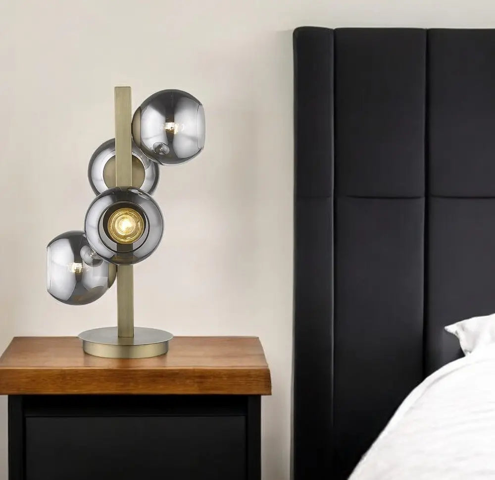 24" Brass Metal Four Light Novelty Table Lamp With Silver Metallic Globe Shades HomeRoots