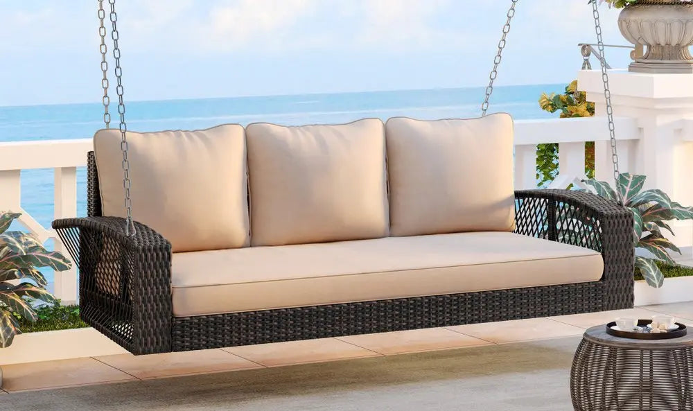 69" Brown Woven Rattan Outdoor Swing Chair with Beige Cushions - NOBLE HOME INTERIORS