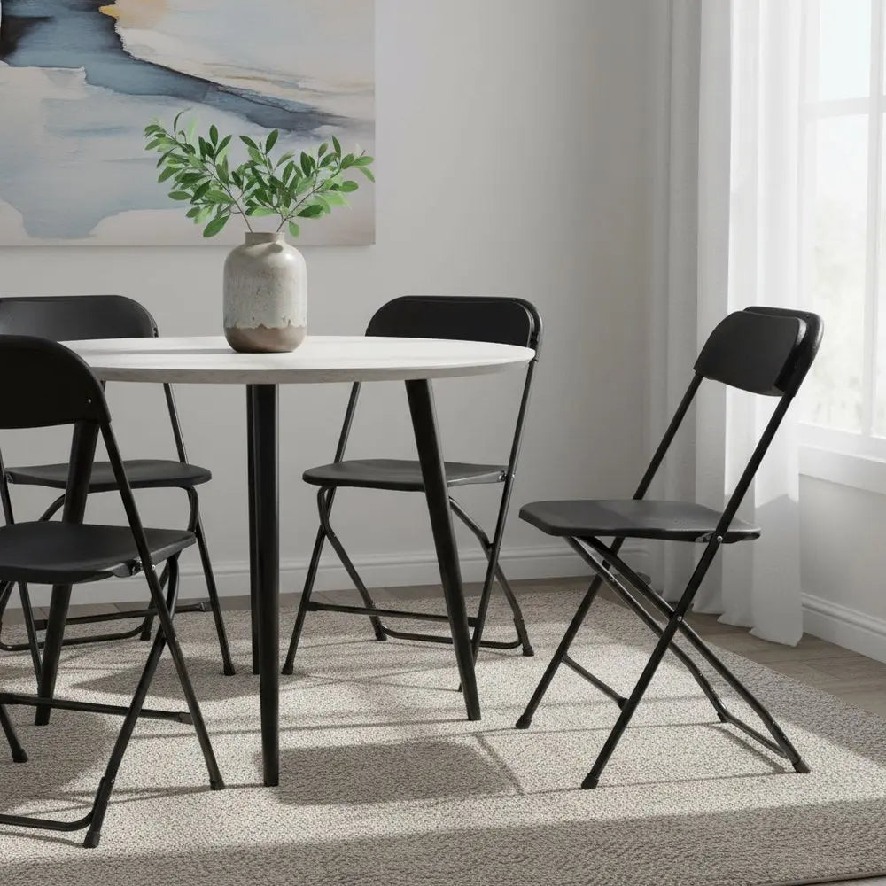 Set of Four Black Metal Outdoor Folding Stacking Dining Chairs - NOBLE HOME INTERIORS