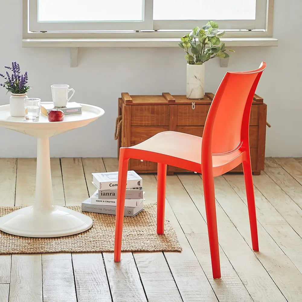 Set of Four Orange Heavy Duty Plastic Outdoor Stacking Dining Chairs - NOBLE HOME INTERIORS