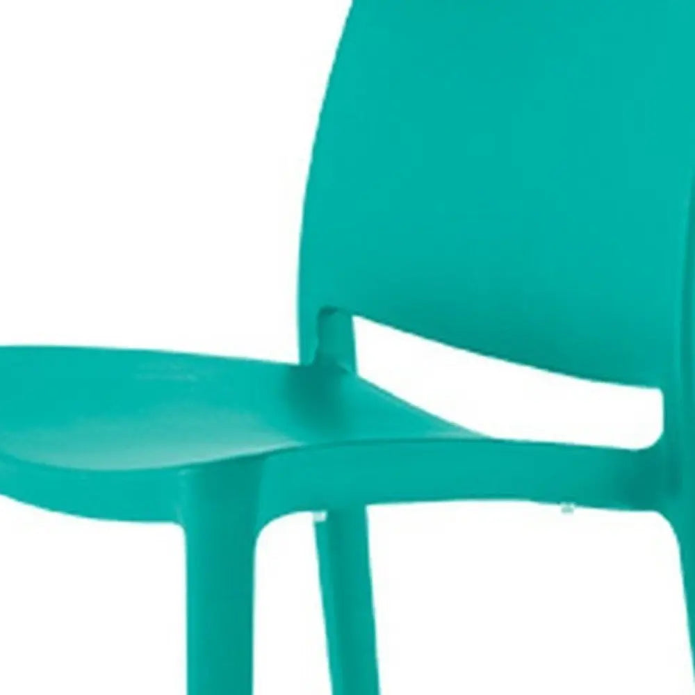 Set of Four Turquoise Heavy Duty Plastic Outdoor Stacking Dining Chairs - NOBLE HOME INTERIORS