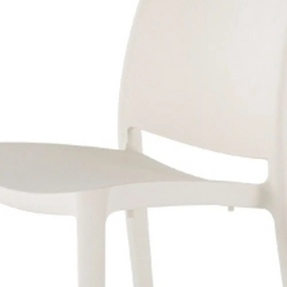 Set of Four White Heavy Duty Plastic Outdoor Stacking Dining Chairs - NOBLE HOME INTERIORS
