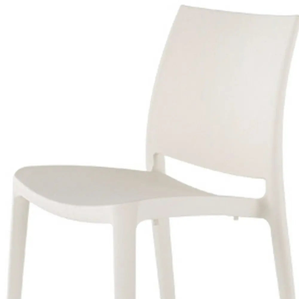 Set of Four White Heavy Duty Plastic Outdoor Stacking Dining Chairs - NOBLE HOME INTERIORS