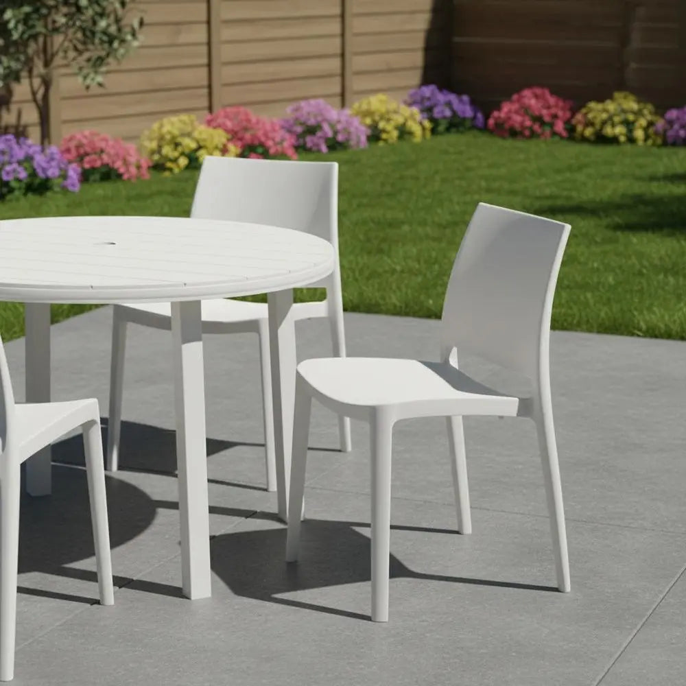 Set of Four White Heavy Duty Plastic Outdoor Stacking Dining Chairs - NOBLE HOME INTERIORS