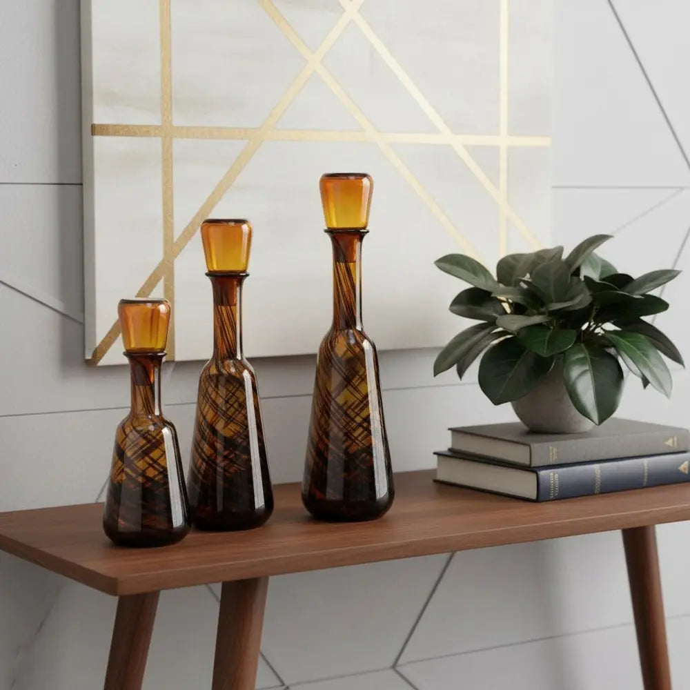 Set of Three Amber Abstract Swirl Glass Decorative Bottles With Stoppers - NOBLE HOME INTERIORS