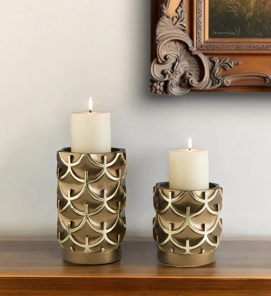 Set Of Two Antiqued Brass Tabletop Pillar Candle Holders - NOBLE HOME INTERIORS