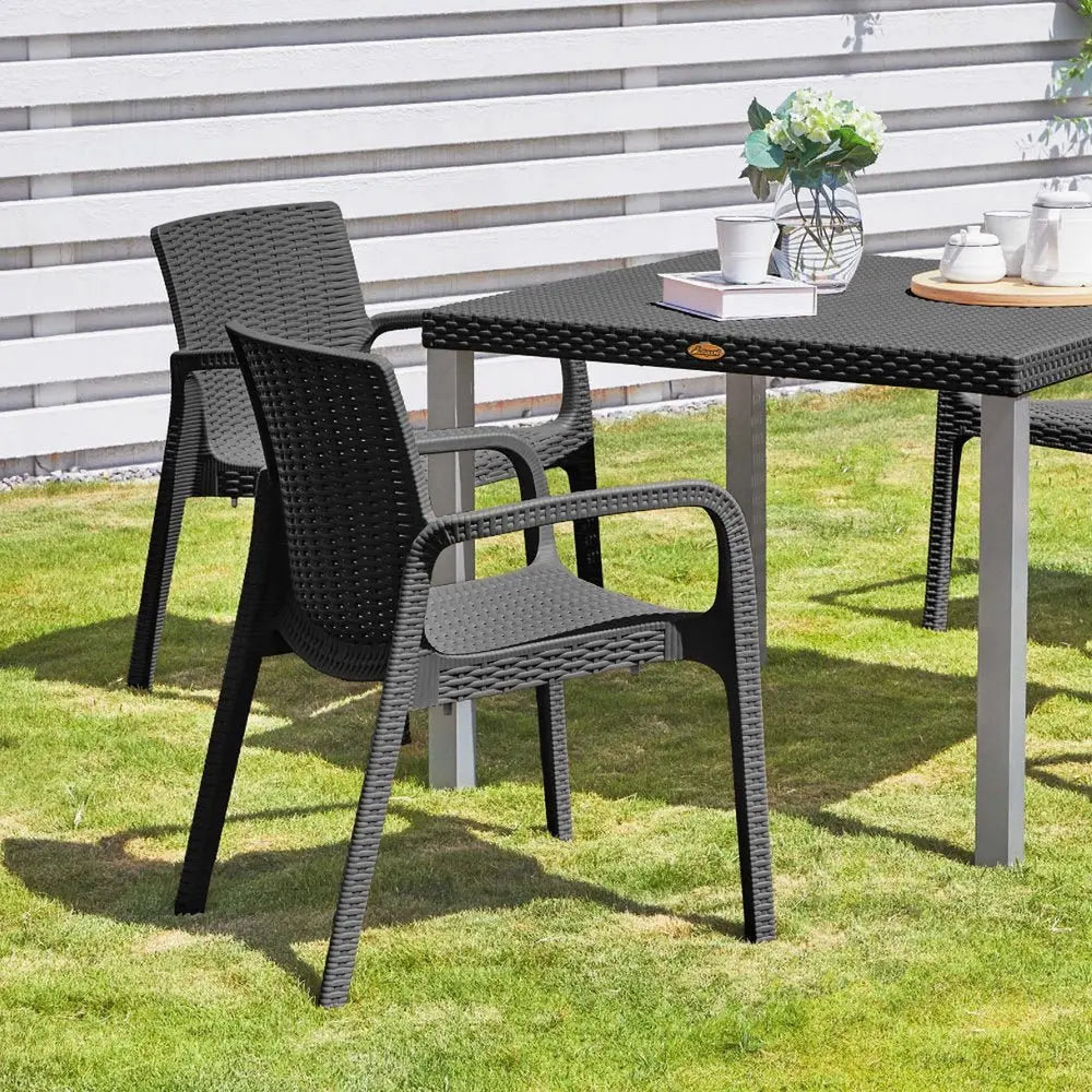 Set of Two Black Faux Rattan Heavy Duty Plastic Outdoor Stacking Arm Chairs - NOBLE HOME INTERIORS
