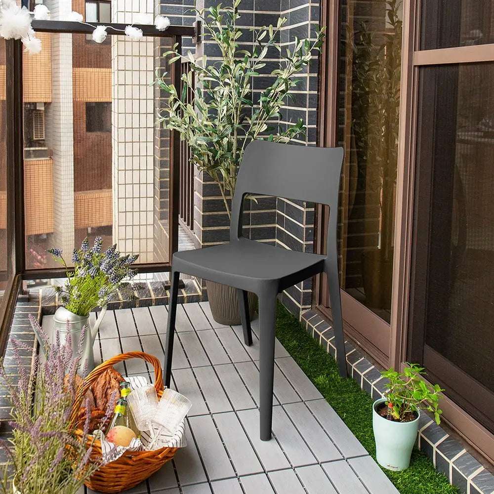 Set of Two Black Heavy Duty Plastic Outdoor Stacking Accent Chairs - NOBLE HOME INTERIORS