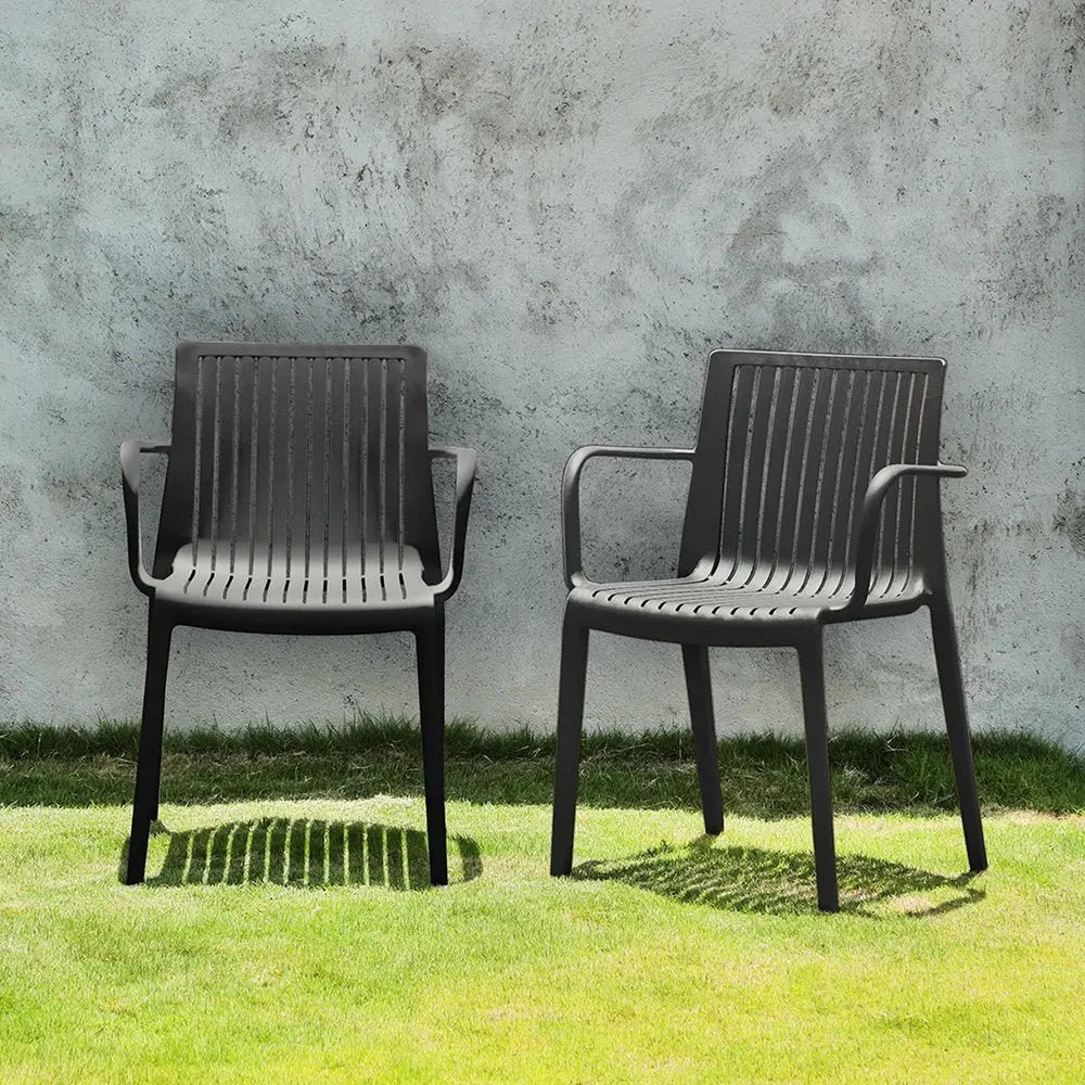 Set of Two Black Heavy Duty Plastic Outdoor Stacking Arm Chairs - NOBLE HOME INTERIORS