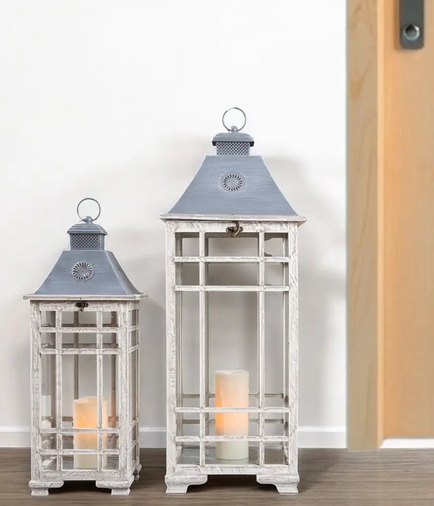 Set of Two White And Silver Distressed Geometric Metal Floor Lantern Candle Holders - NOBLE HOME INTERIORS