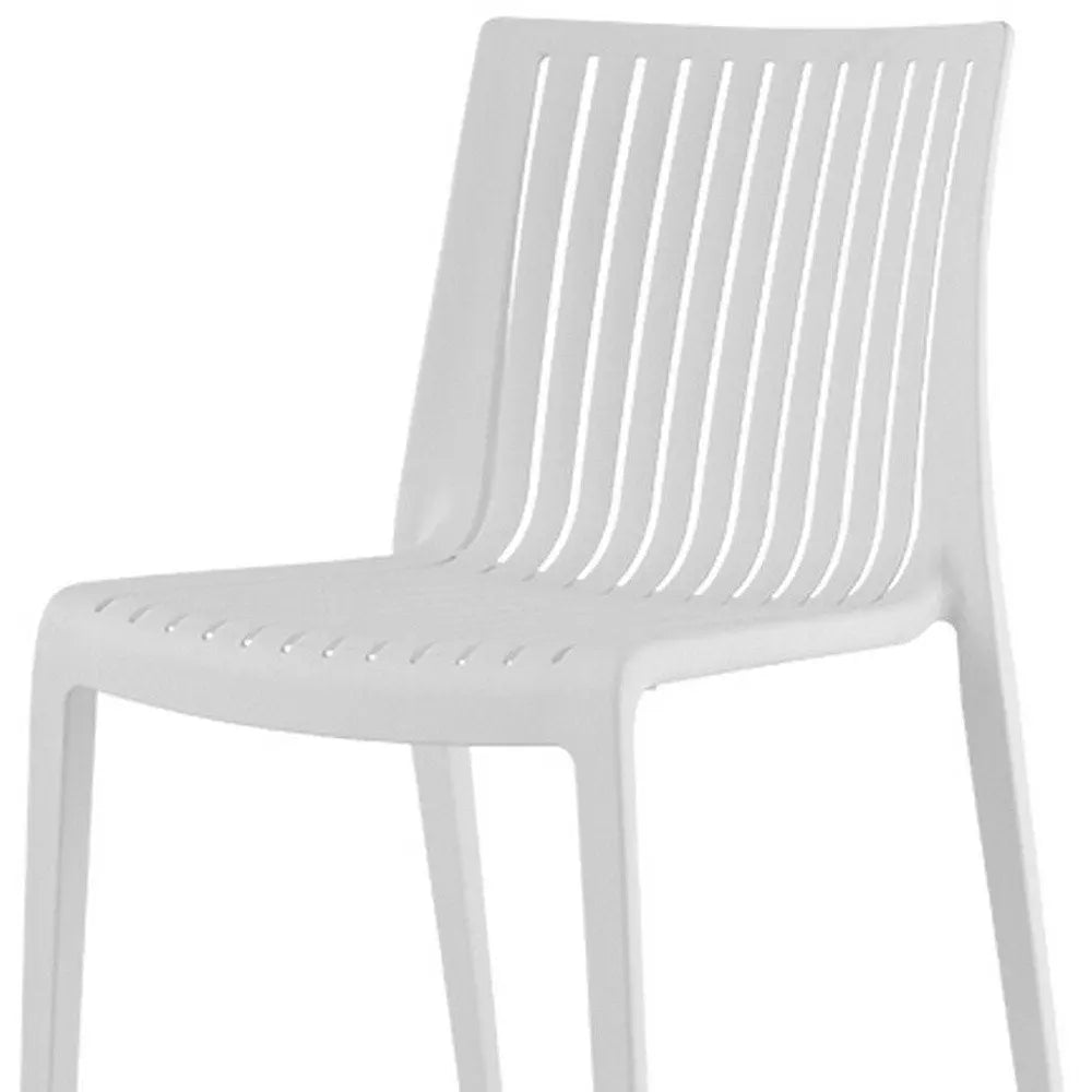 Set of Two White Heavy Duty Plastic Outdoor Stacking Accent Chairs - NOBLE HOME INTERIORS