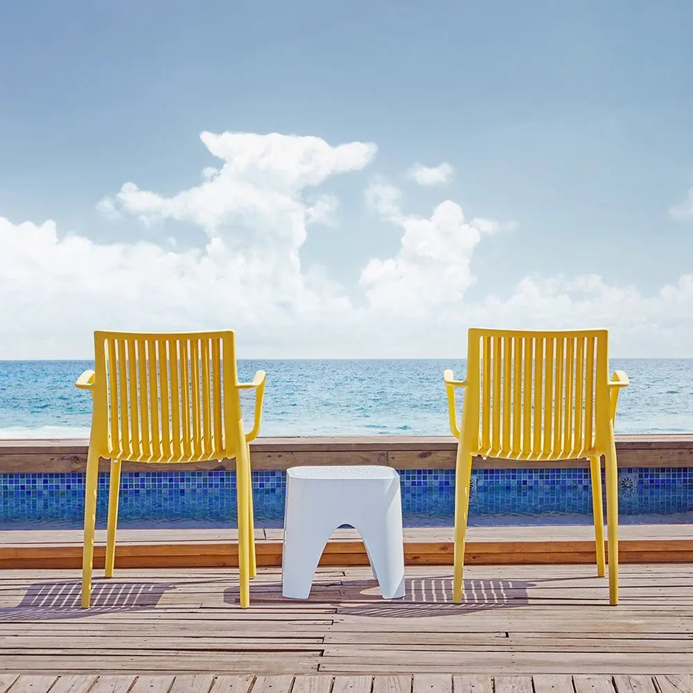 Set of Two Yellow Heavy Duty Plastic Outdoor Stacking Arm Chairs - NOBLE HOME INTERIORS