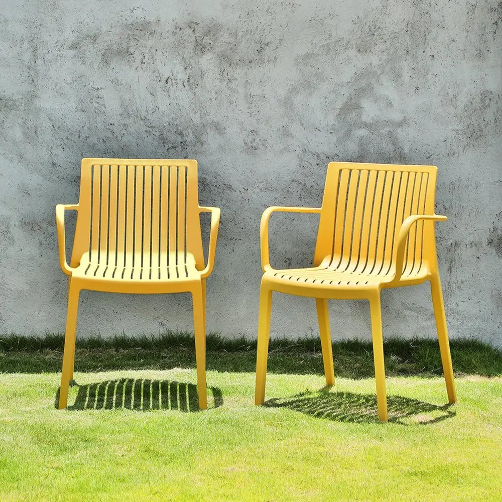 Set of Two Yellow Heavy Duty Plastic Outdoor Stacking Arm Chairs - NOBLE HOME INTERIORS