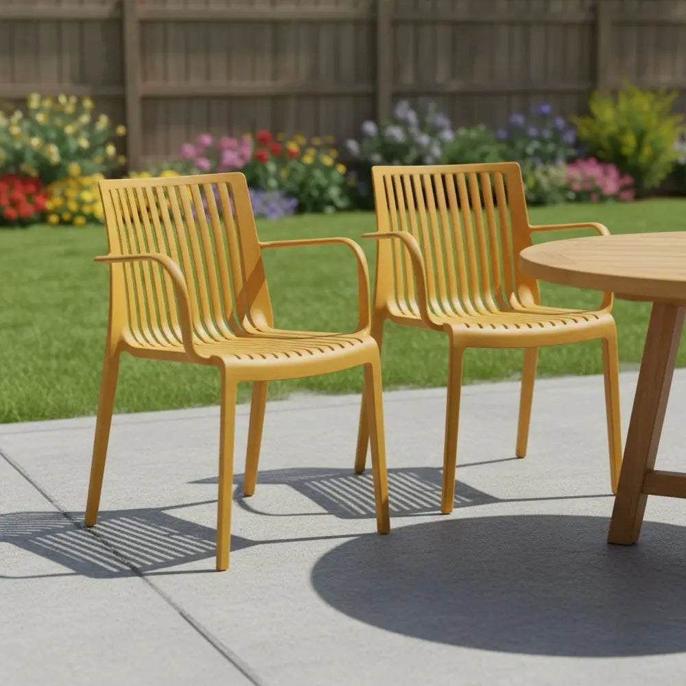 Set of Two Yellow Heavy Duty Plastic Outdoor Stacking Arm Chairs - NOBLE HOME INTERIORS